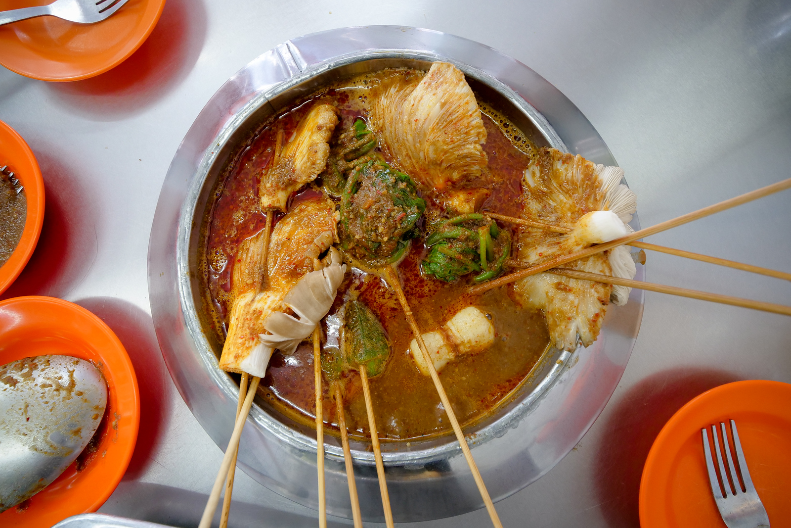 Best Restaurants in Melaka - Choose your vegetables and meat, and then cook them all yourself in this spicy Chinese Malay peanut sauce
