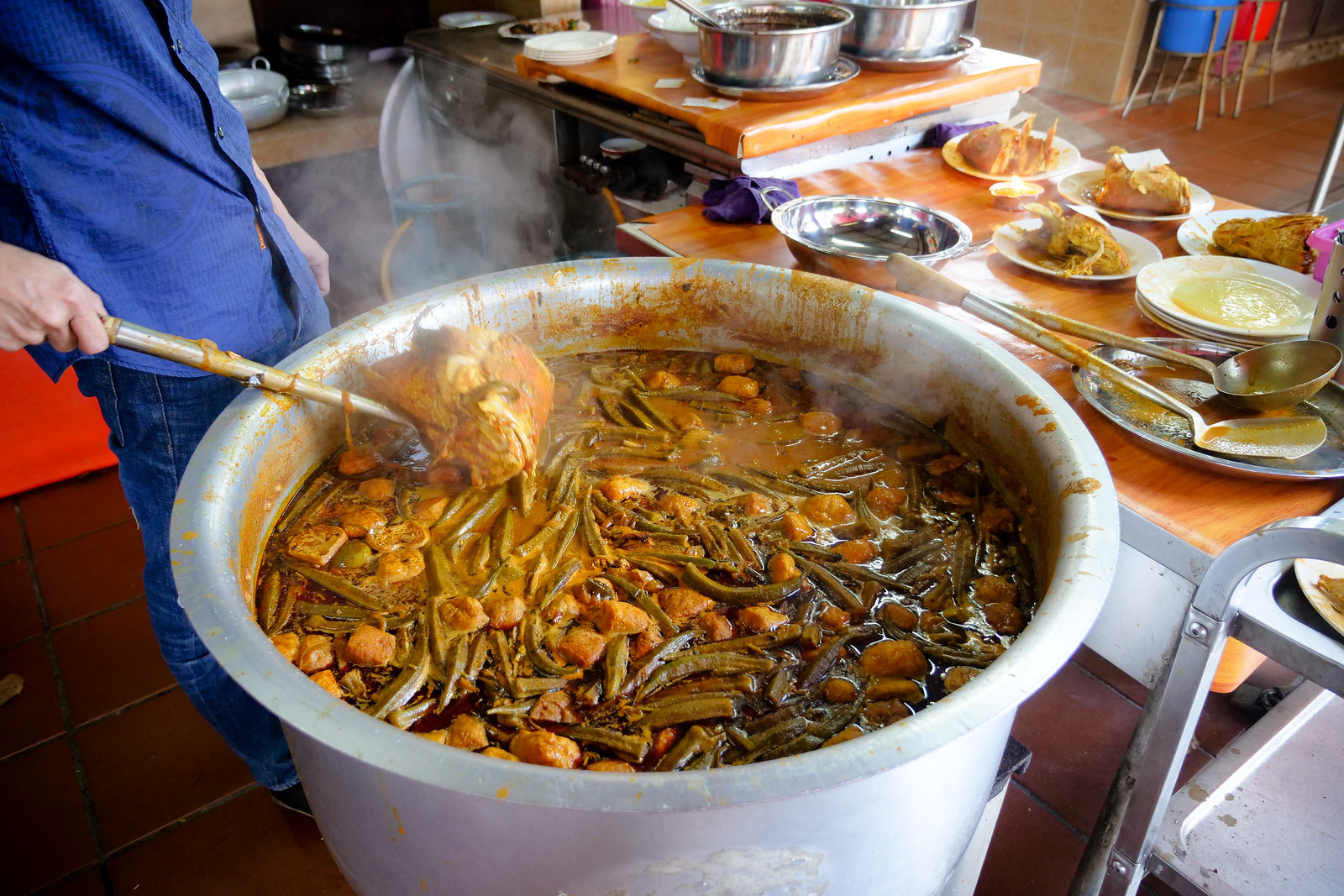 Gorgeous and thick curry broth to ladle over every fish head served here